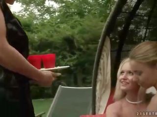 Two girlfriends punishing tempting blonde